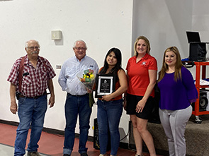 Employee of the Year Ms. Yumara Martinez with the superintendent and board members